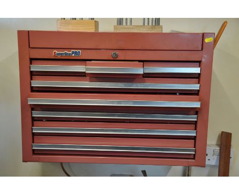 A SUPERLINE PRO MECHANICS TOOL CHEST, with eight drawers full of milling Machine tools and cutters