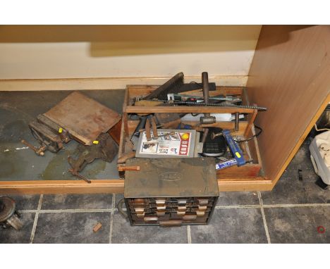 A CARPENTERS TOOL TRAY CONTAINING TOOLS, including Record clamps, mallets, a multi drawer screw cabinet containing rotary too