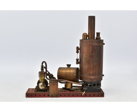 A VERTICAL SINGLE CYLINDER LIVE STEAM ENGINE, not tested, spirit fired, vertical wooden clad copper boiler with sight glass p