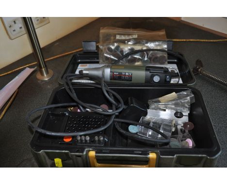 A PROXXOM IBS/E ROTARY TOOL, in case with accessories