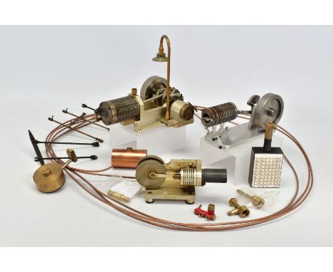 A HANDBUILT MODEL HORIZONTAL SINGLE CYLINDER ENGINE, powering a flywheel which powers an electric motor and lamp, not tested,