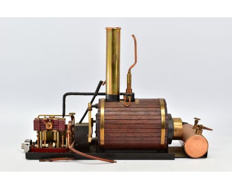 A HANDBUILT MODEL VERTICAL TWIN CYLINDER LIVE STEAM MARINE ENGINE, not tested, spirit gas fired horizontal wooden clad boiler