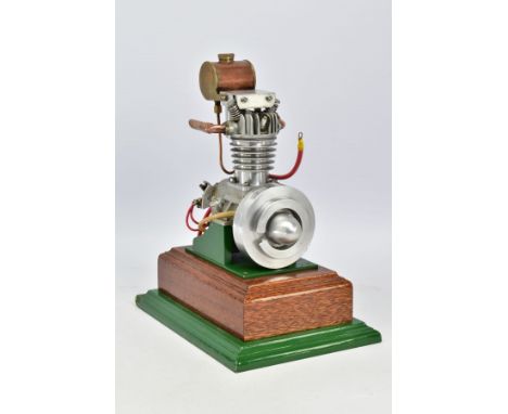 AN UNMARKED VERTICAL SINGLE CYLINDER AIR COOLED ELECTRICALLY POWERED ENGINE, not tested, powered by AC Delco wiper motor in b