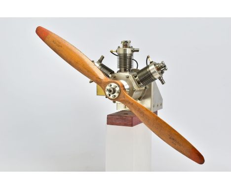 A HANDBUILT MODEL THREE CYLINDER RADIAL AIRCRAFT ENGINE, not tested, constructed and finished to a very high standard, in lig