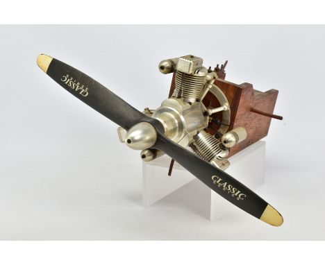 A HANDBUILT MODEL THREE CYLINDER RADIAL AIRCRAFT ENGINE, not tested, constructed and finished to a very high standard, in run