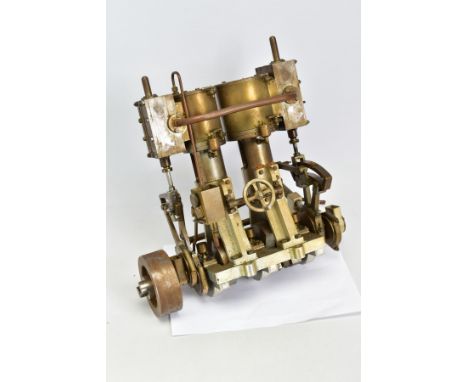A HANDBUILT MODEL VERTICAL TWIN CYLINDER MARINE ENGINE, not tested, in need of some minor attention, of brass, steel and alum