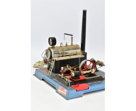 AN UNBOXED WILESCO D222 LIVE STEAM ENGINE, not tested, horizontal electrically powered boiler mounted on tinplate brick patte