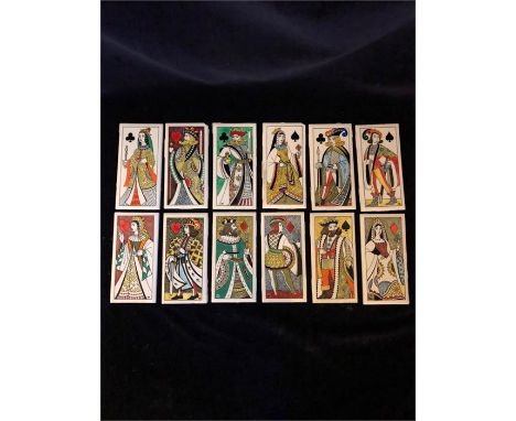 A set of twelve Carter tiles based on the Royal playing card characters of Jack Queen King of the four suits