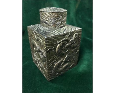 A Chinese white metal tea caddy