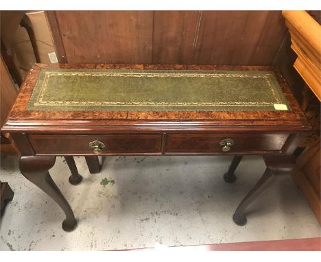 A Sofa or console table with green leather top and two drawers