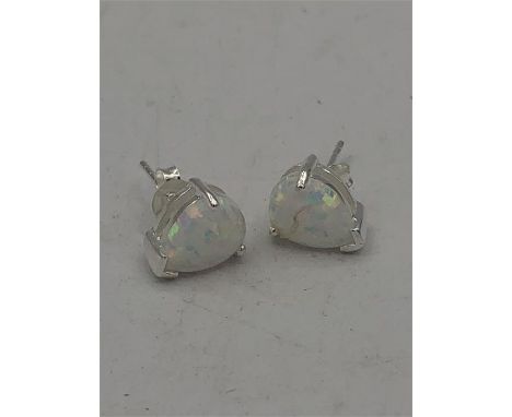 A Pair of silver and pear shaped opal stud earrings