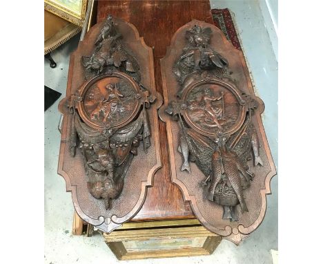 A Pair of French 19th Century wood carvings with a hunting theme.