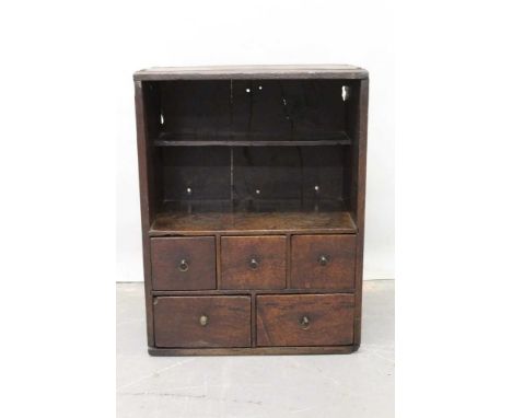 18th century oak spice cupboard with open shelf above an arrangement of five drawers, 40.5cm wide x 53cm high.Condition repor