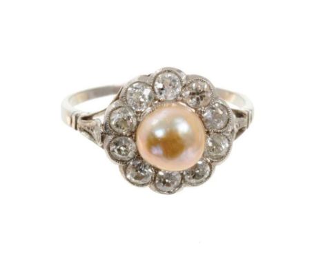 Antique pearl and diamond cluster ring with a cultured button pearl (not tested for natural origin) measuring approximately 6