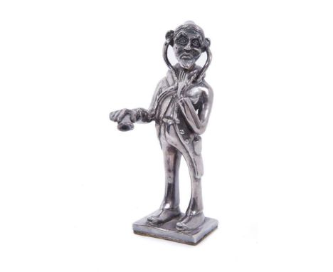 Continental silver model of a physician holding a stethoscope (London import marks Britannia Standard 1977) 12.5cm overall he