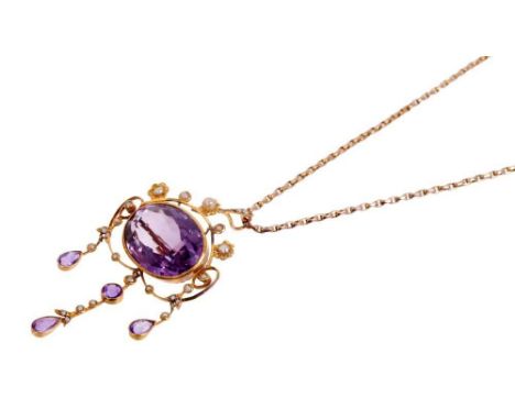 Edwardian amethyst and seed pearl pendant necklace, the large oval mixed cut amethyst measuring approximately 24mm x 16mm, in