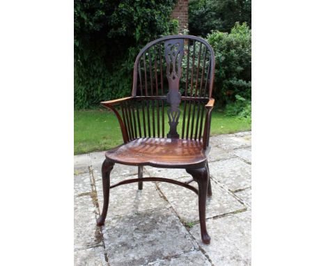 George III fruitwood and elm Windsor elbow chair of generous proportions and good patination, with pierced splat and stick ba