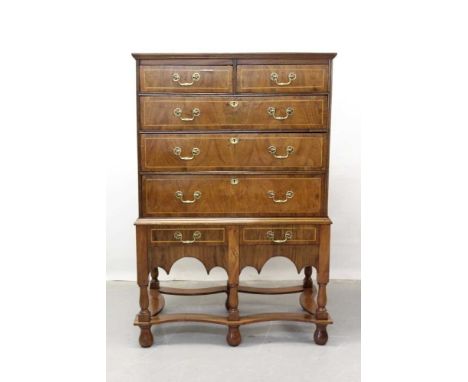 18th century and later walnut chest on stand with two short and three long graduated drawers and two drawers below with brass