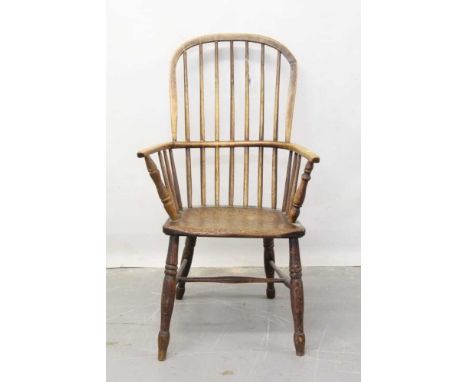 19th century ash and elm stick back Windsor chair, with well figured saddle seat on turned legs and H-shaped stretcher 