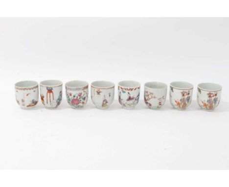 Eight 18th century Chinese porcelain coffee cups, decorated in famille rose enamels with various figural scenes and floral pa