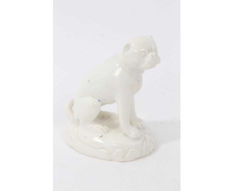 A Derby model of a pug, circa 1825, modelled standing on a scrollwork base, sparsely decorated in gilt, 6.5cm highCondition r
