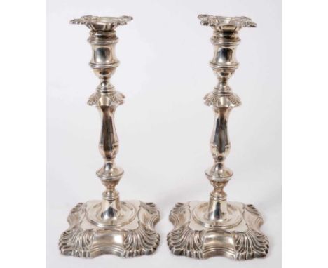 Fine quality pair of Edwardian silver candlesticks, with slender baluster and knopped stems and cotton reel candleholders, in