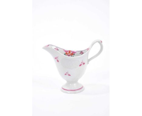 New Hall helmet shaped milk jug, circa 1790, painted in enamel with floral patterns, 10cm heightCondition report: Good condit