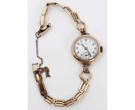 1930s ladies Rolex gold wristwatch, the circular white enamel dial with subsidiary seconds, Rolex Prima 15 jewel movement in 