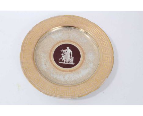 Coalport plate, circa 1800-10, painted in the Etruscan style with a classical statue and Greek key border, probably made in t