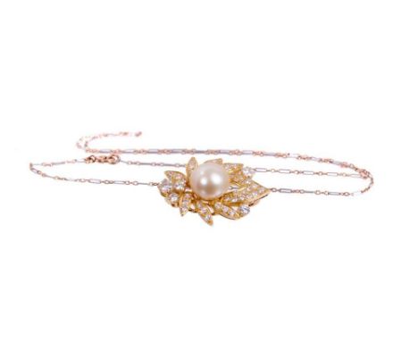 Cultured pearl and diamond cluster slide for a two-strand necklace, the 9.9mm cultured button pearl in leaf shaped gold and d