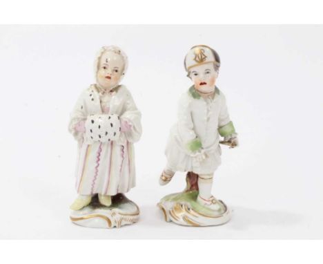 Rare pair of Frankenthal porcelain figures of children, circa 1770, decorated in enamels and gilt, on scrollwork bases, 10cm 