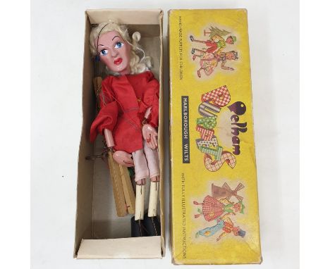 A Pelham puppet, Prince Charming, in a yellow box 
