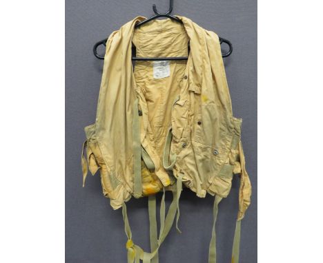 RAF 1941 Pattern Yellow Mae Westyellow drill material vest.  Tan canvas light pocket on the right side.  Left chest mirror po