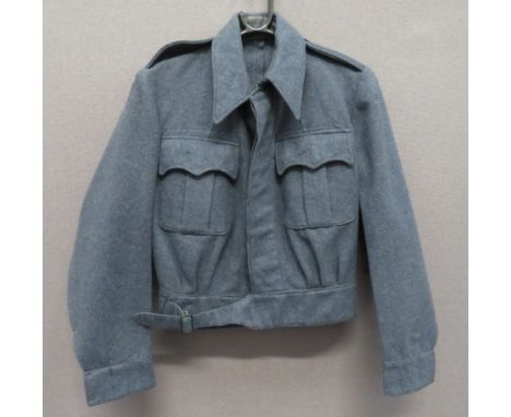 1941 Dated WAAF Blouseblue grey, woollen, single breasted, closed collar, short blouse.  Pleated chest pockets with buttoned 