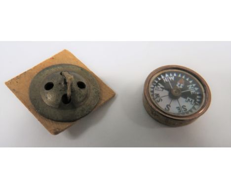 WW2 RAF Escape and Evasion Fly Button Compasstwo piece, brass fly buttons.  The base button with central spike to rest the to