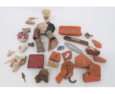Selection of Excavated Itemsincluding 17th century, stoneware, Bellarmine Bartmann face jug neck ... Clay pipe ornate bowl ..
