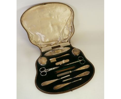 ENGINE TURNED SILVER MANICURE SET, by HORTON & ALLDAY, including; silver backed nail buffer, two circular cut glass jars with