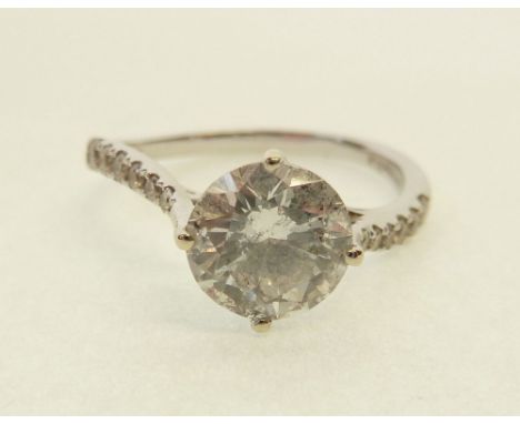 18CT WHITE GOLD SOLITAIRE DIAMOND RING, twisted four claw set round brilliant diamond, 1.53ct approx., the twisted shoulders 