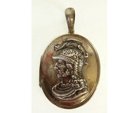 VICTORIAN SILVER OVAL LOCKET, APPLIED WITH THE BUST OF A WARRIOR WITH DRAGON SURMOUNTED HELMET, 1 ¾" (4.5cm) long