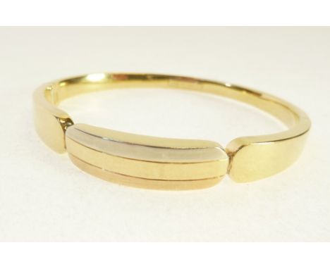 AN 18ct GOLD STIFF BANGLE, 15.8gms 