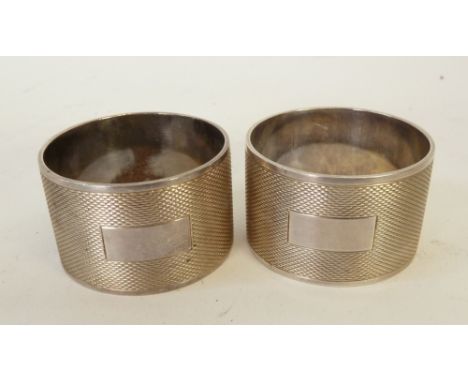 PAIR OF ENGINE TURNED SILVER NAPKIN RINGS, Sheffield 1940, 3.80oz