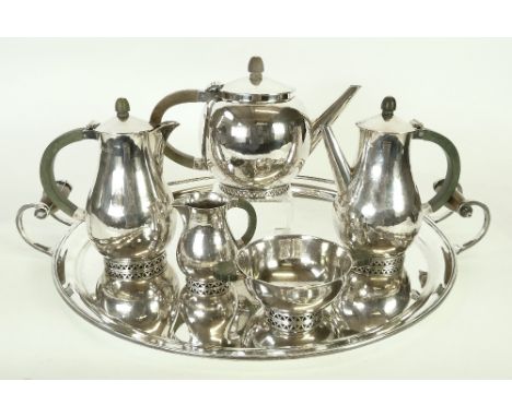 ART DECO SILVER THREE PIECE TEA SERVICE, WITH MATCHING CAFÉ AU LAIT POTS AND SALVER, by JAMES R. OGDEN & SON LTD., planished 
