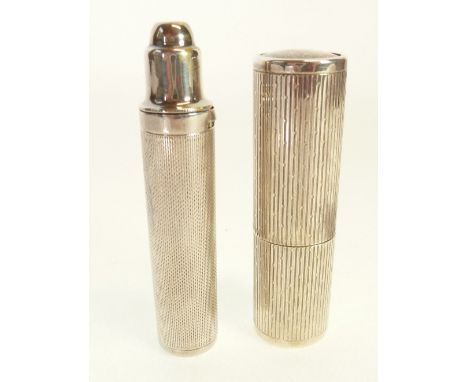 AN ENGINE TURNED SILVER BATTERY OPERATED POCKET TORCH, London 1939, 3" (7.6cm) long, AND AN ENGINE TURNED SILVER ATOMISER, im