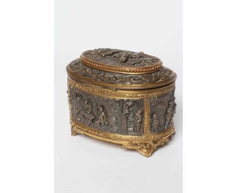 A FRENCH GILDED ORMOLU OVAL JEWELLERY CASKET, late 19th century, with hinged top and medieval scenes cast to the front back a