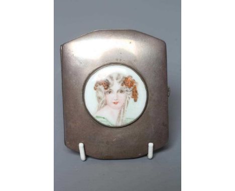 A CONTINENTAL CIGARETTE CASE stamped 830S, early 20th century, of shaped oblong form, the fascia inset with a porcelain round
