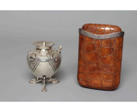 A LATE VICTORIAN SILVER TABLE LIGHTER by Sam. W. Smith, Birmingham 1893, of rounded conical form chased and repousse with scr