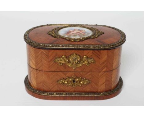 A LOUIS XV STYLE KINGWOOD OVAL TRINKET BOX, early 20th century, with metal mounts and inset Sevres style porcelain plaque to 