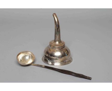 A GEORGE III SILVER TODDY LADLE, maker's mark JS, London possibly 1792, the plain oval bowl on a twisted baleen handle with s