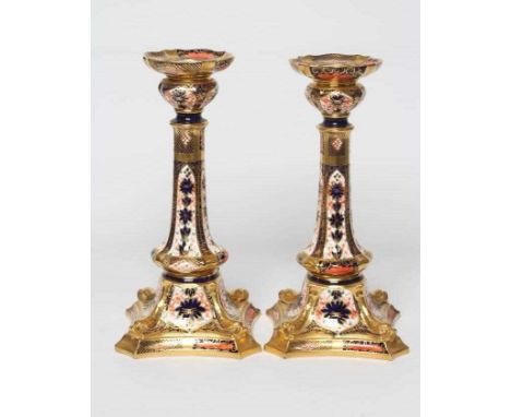 A PAIR OF ROYAL CROWN DERBY CHINA DOLPHN IMARI PATTERN ELECTRIC LAMP BASES, mid 20th century, in the form of candlesticks wit