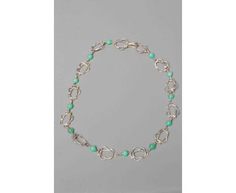 ANNO DOMINI - an Ann O'Donnell silver wirework necklace, the thirteen panels with twelve green bead spacers, with hook clasp,